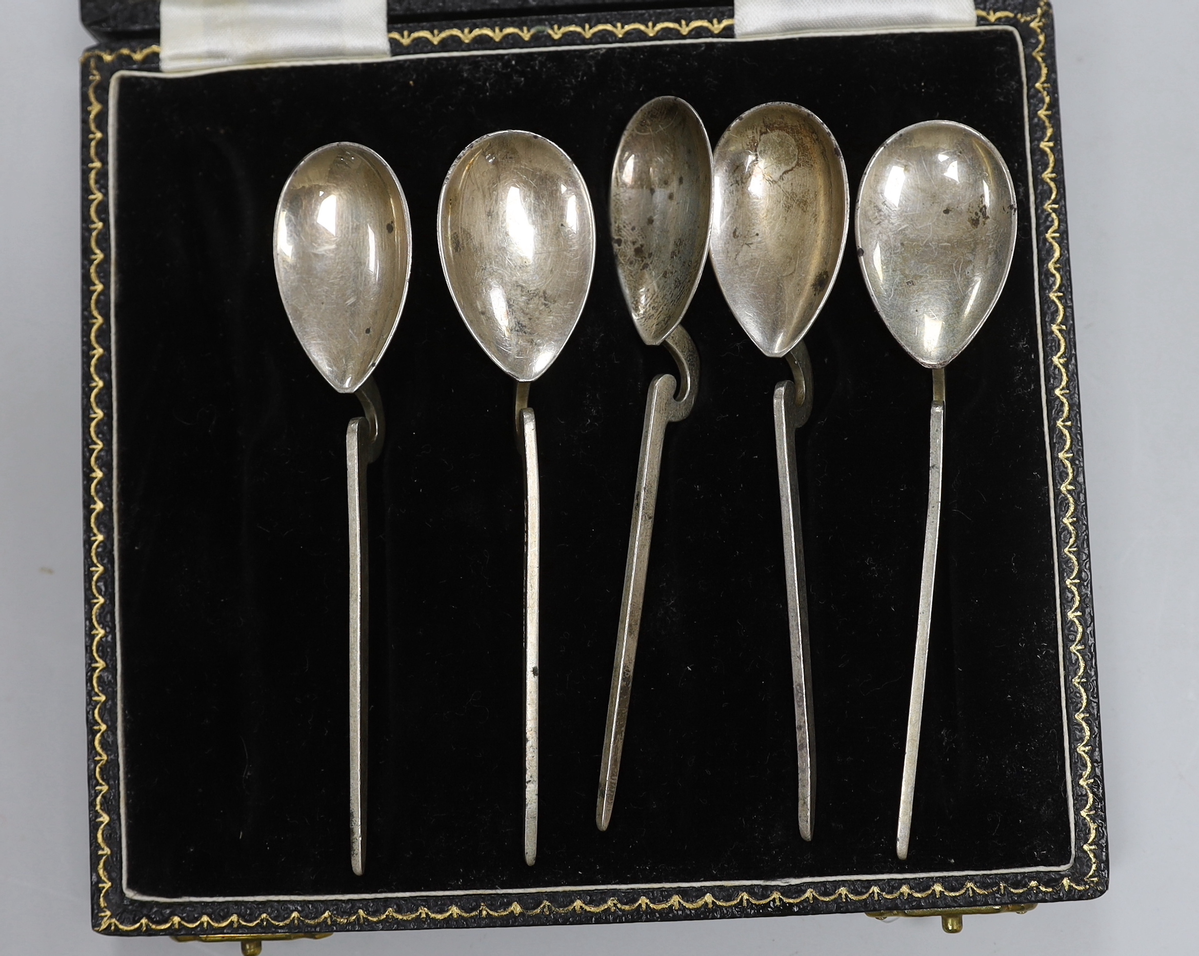Six assorted cased sets of flatware including bean end coffee spoon, preserve spoons and spoon and pusher.
